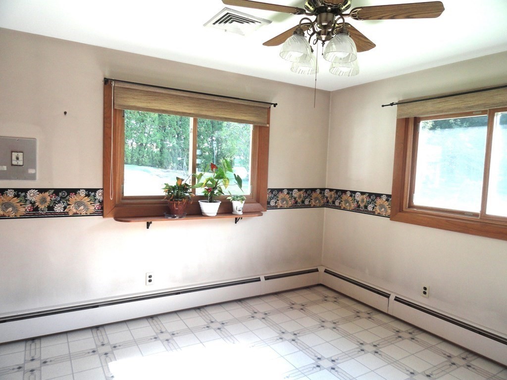 88 Charlton Road Dudley, MA 01571 - Photo 16 of 40 a view of a kitchen with a large window