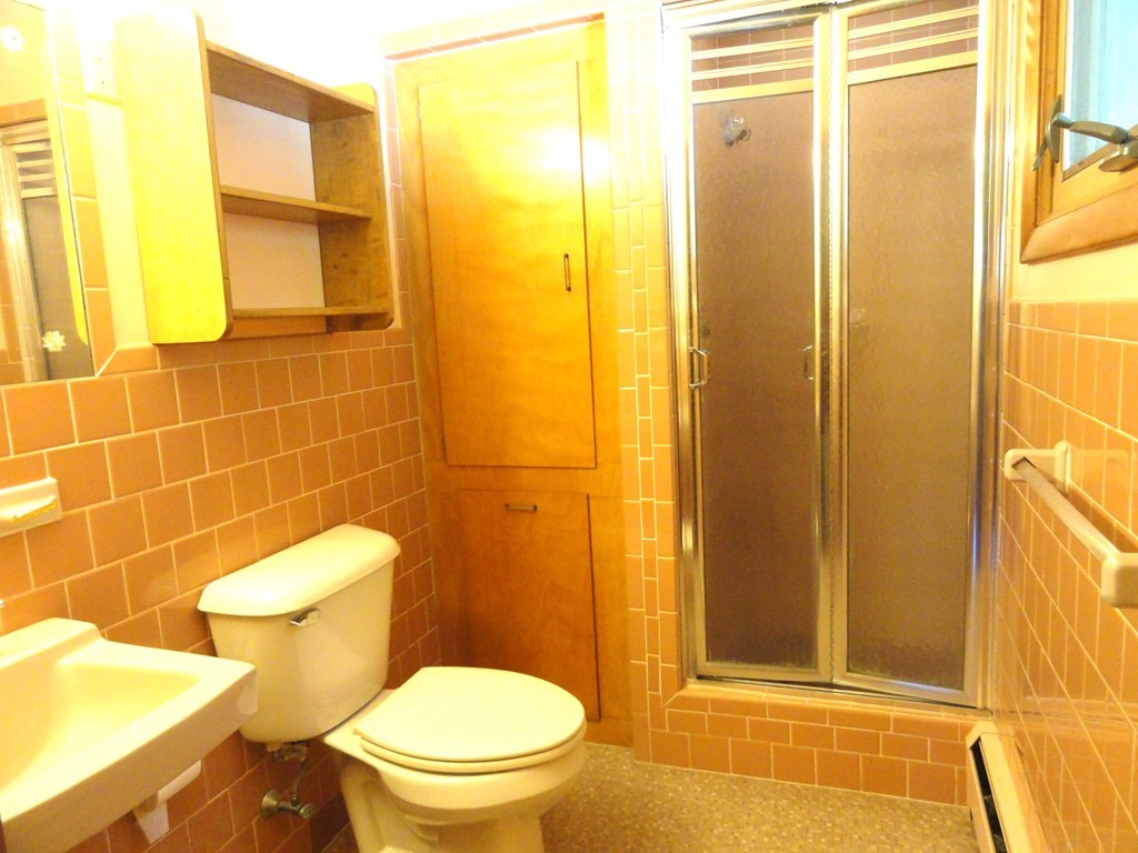 88 Charlton Road Dudley, MA 01571 - Photo 19 of 40 a bathroom with a toilet and a shower