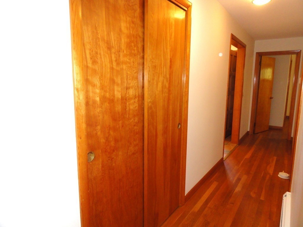 88 Charlton Road Dudley, MA 01571 - Photo 20 of 40 a view of a room with wooden floor