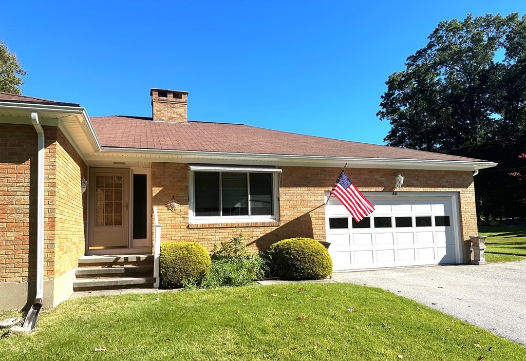 88 Charlton Road Dudley, MA 01571 - Photo 2 of 40 a front view of house with yard