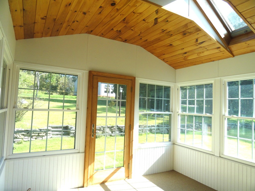 88 Charlton Road Dudley, MA 01571 - Photo 27 of 40 a large window in a room next to a window