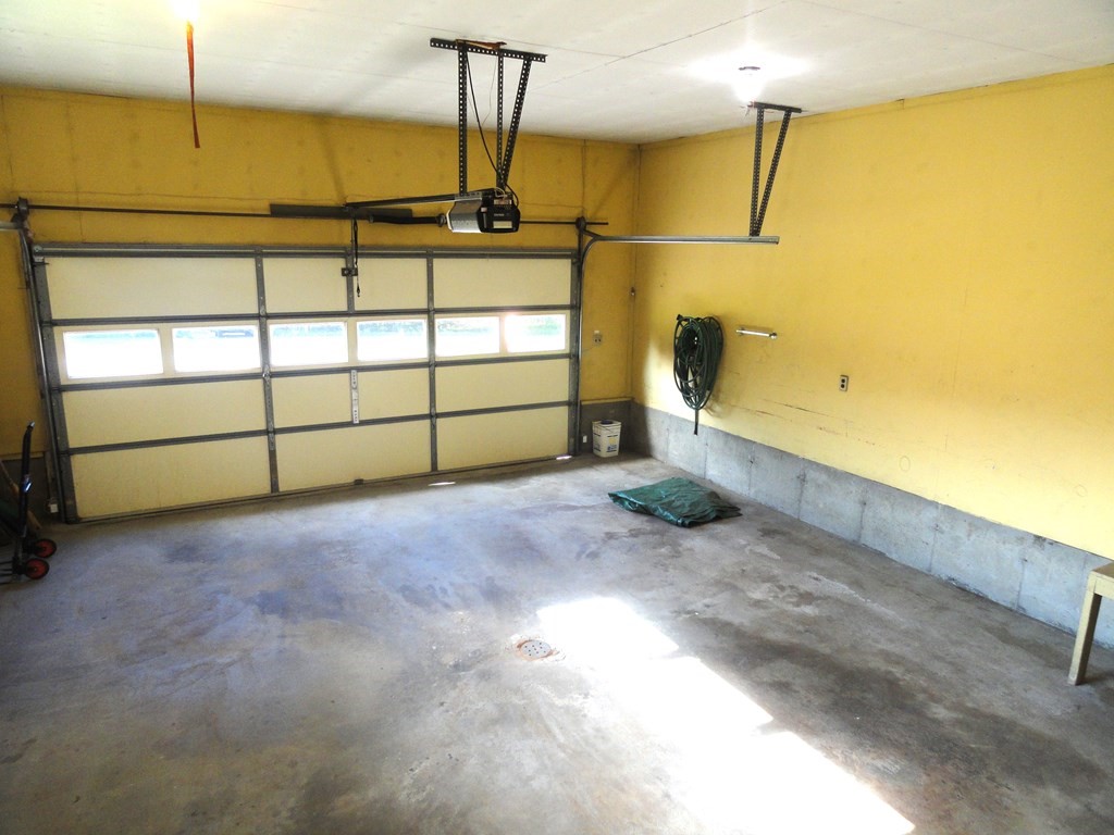 88 Charlton Road Dudley, MA 01571 - Photo 33 of 40 a view of a indoor garage
