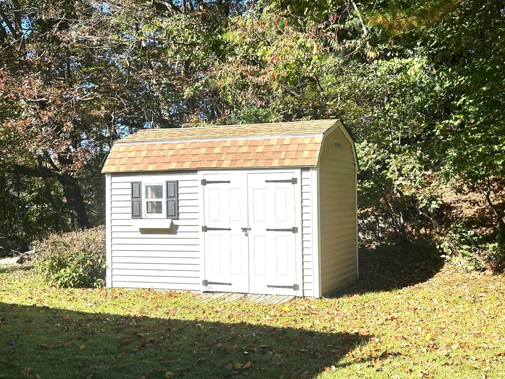 88 Charlton Road Dudley, MA 01571 - Photo 37 of 40 a view of a house with a yard