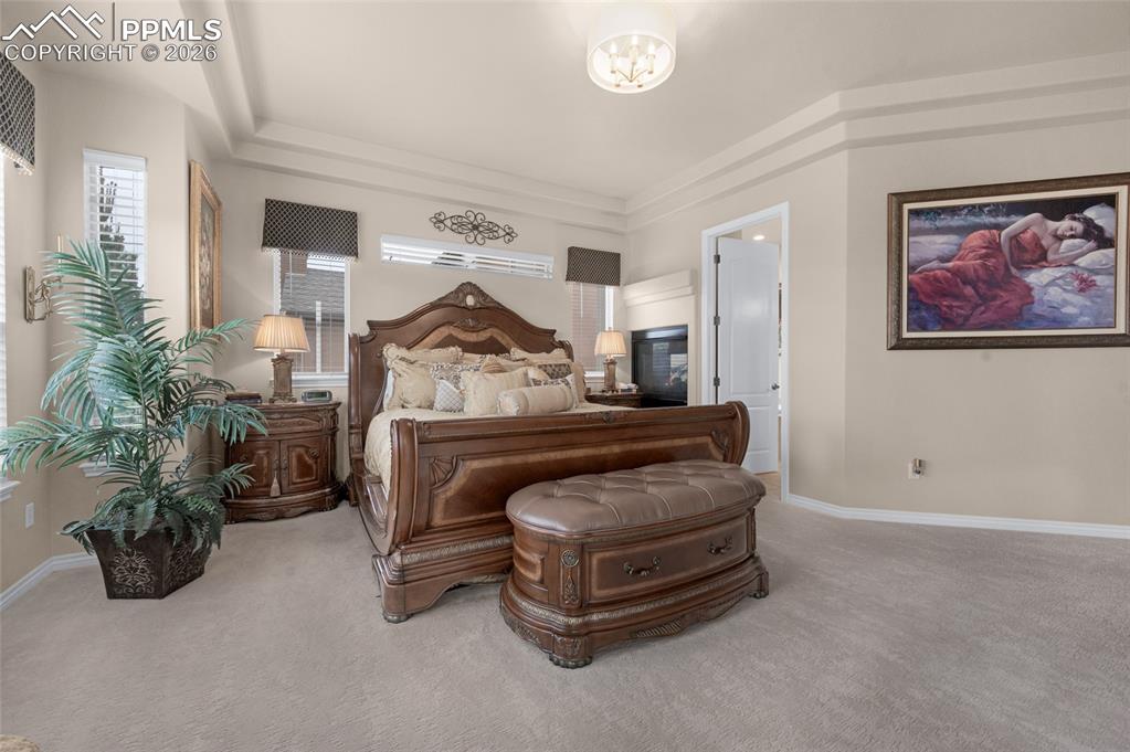 13320 Clinet Drive Colorado Springs, CO 80921 - Photo 20 of 50 a room with furniture and a chandelier