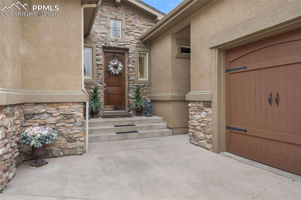 13320 Clinet Drive Colorado Springs, CO 80921 - Photo 4 of 50 front view of a house with hallway