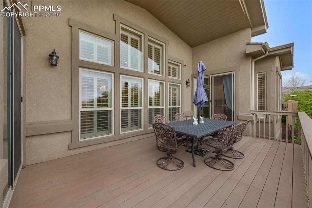 13320 Clinet Drive Colorado Springs, CO 80921 - Photo 43 of 50 a view of balcony with furniture and wooden floor