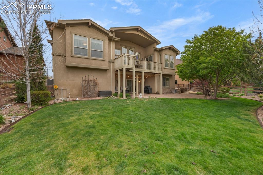 13320 Clinet Drive Colorado Springs, CO 80921 - Photo 45 of 50 a front view of a house with a garden