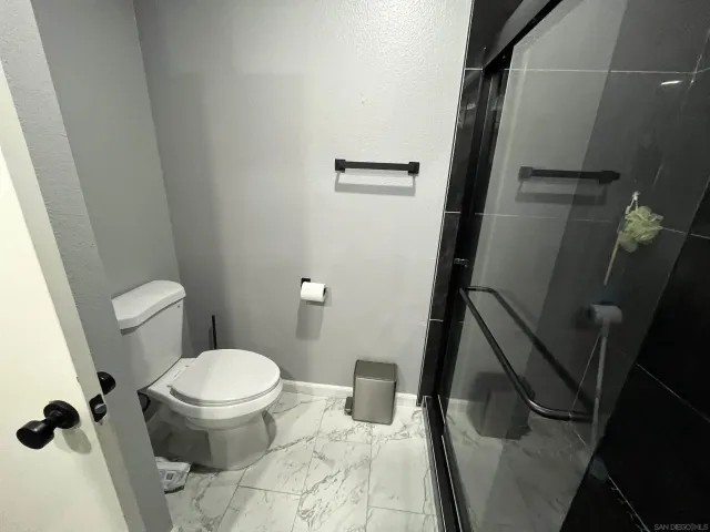 a bathroom with a sink and a toilet