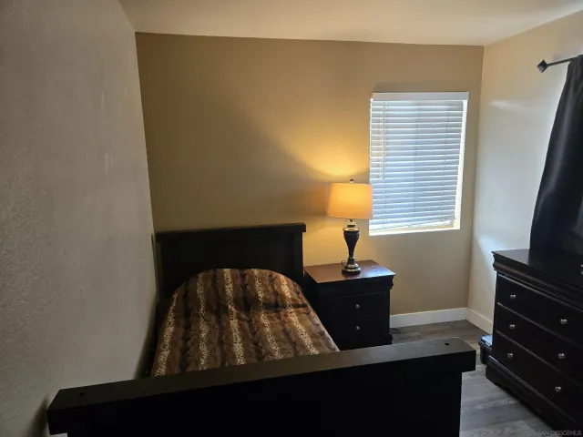 a view of workspace with furniture and window