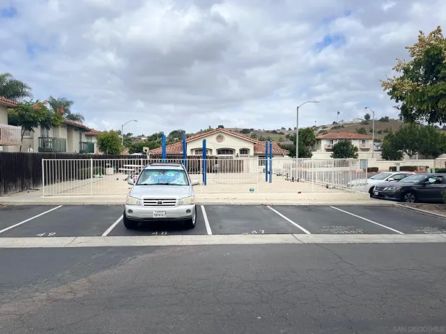 a view of parking with cars