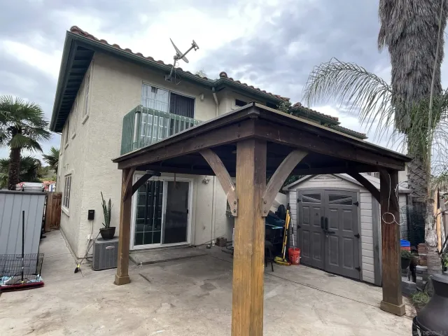 a view of a house with a small cabin
