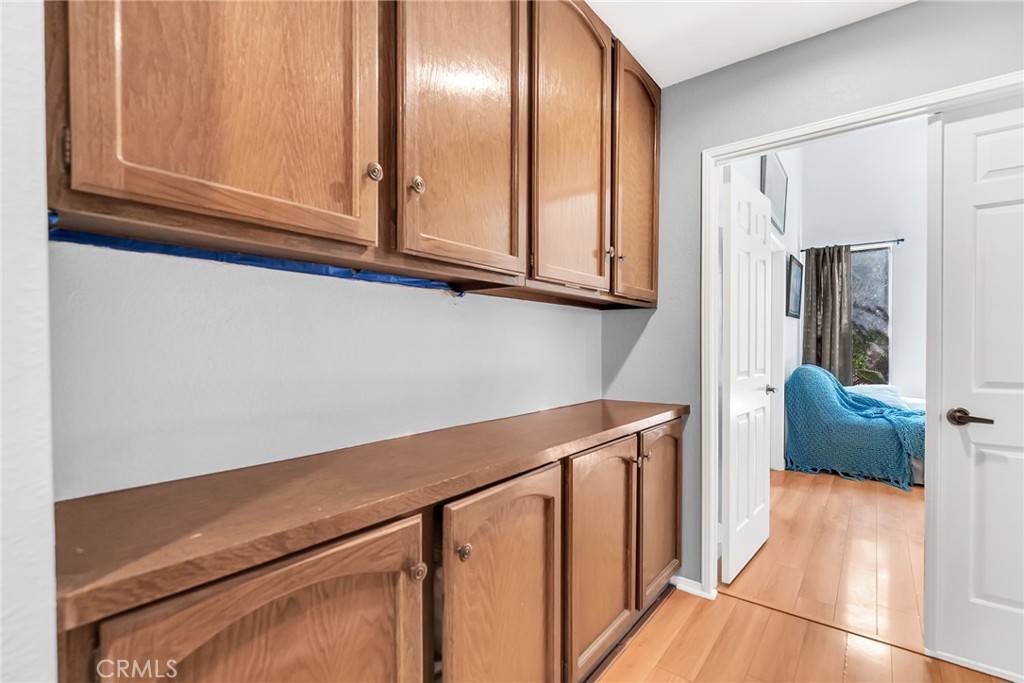 10651 Orchard View Lane Riverside, CA 92503 - Photo 18 of 35 a view of cabinets and wooden floor
