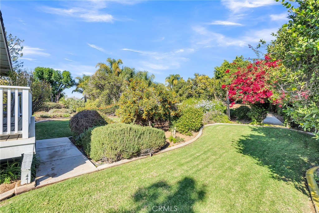 10651 Orchard View Lane Riverside, CA 92503 - Photo 27 of 35 a view of a garden with a building in the background