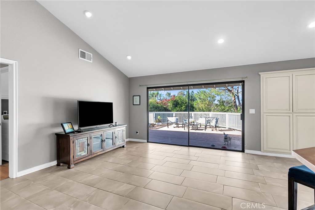 10651 Orchard View Lane Riverside, CA 92503 - Photo 7 of 35 a living room with furniture and a flat screen tv