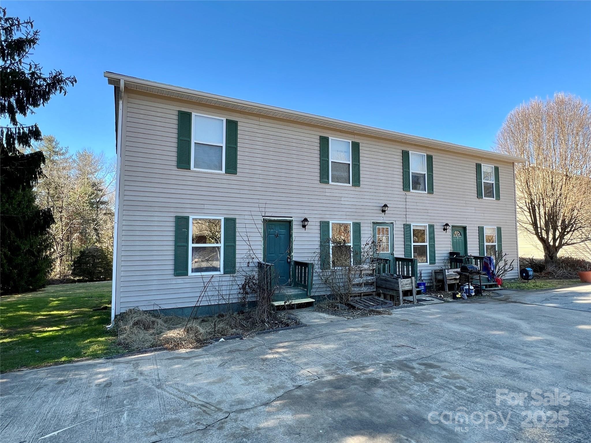 3 Wesley Branch Road Asheville, NC 28806 - Photo 1 of 19 a front view of a house with a yard