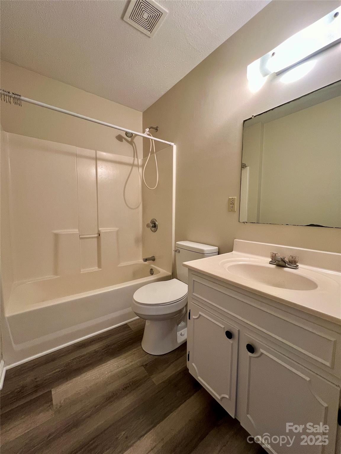 3 Wesley Branch Road Asheville, NC 28806 - Photo 13 of 19 a bathroom with a sink a toilet and shower