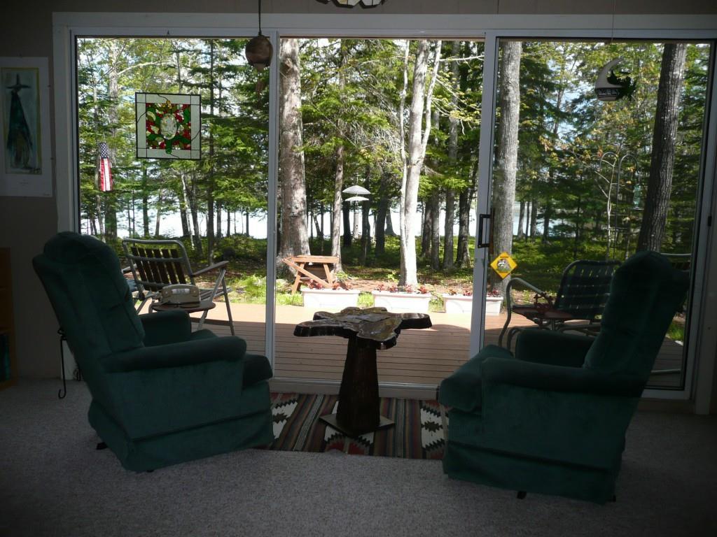 48 Meadow Point Road Lamoine, ME 04605 - Photo 5 of 13 Sun room opening onto deck with cove...