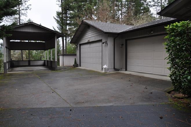 356 Becklin Drive Merlin, OR 97532 - Photo 3 of 29 notice the woodshed behind the garage, n