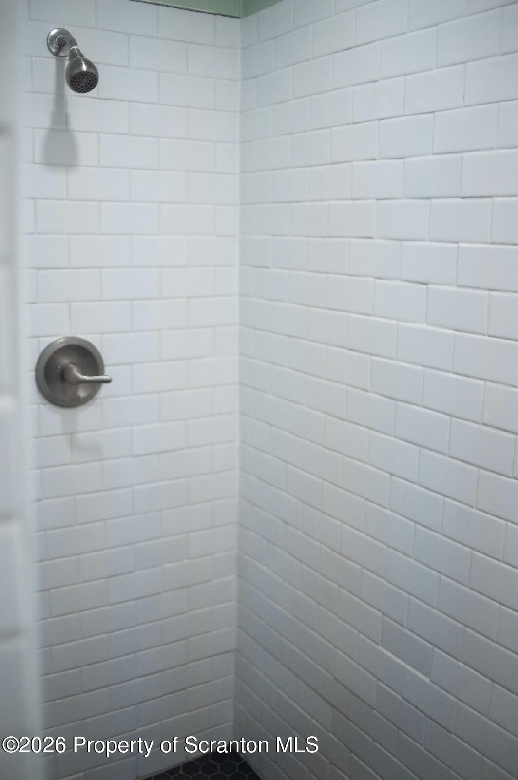 725 Main Street Delta, PA 17314 - Photo 12 of 30 a bathroom with a shower