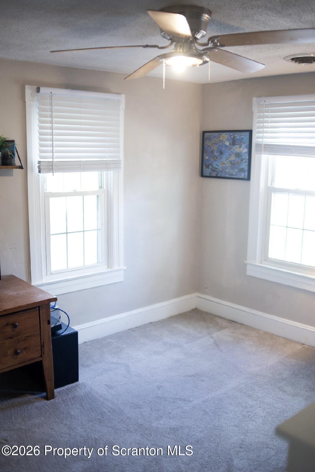 725 Main Street Delta, PA 17314 - Photo 19 of 30 a view of an empty room with a window