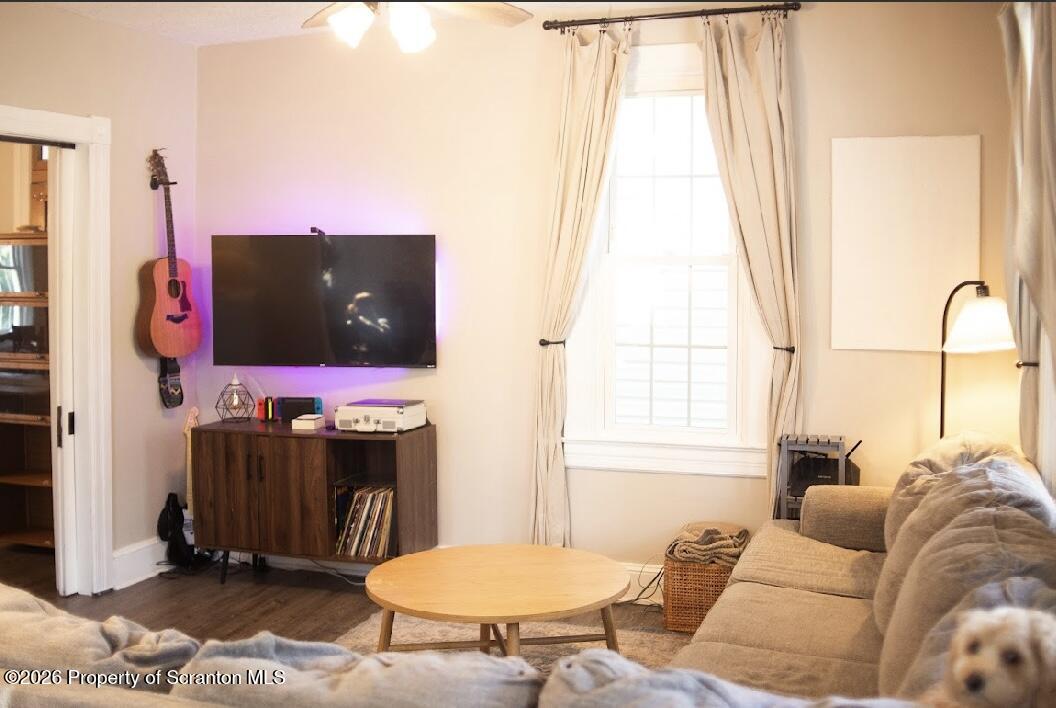 725 Main Street Delta, PA 17314 - Photo 22 of 30 a living room with furniture and a flat screen tv