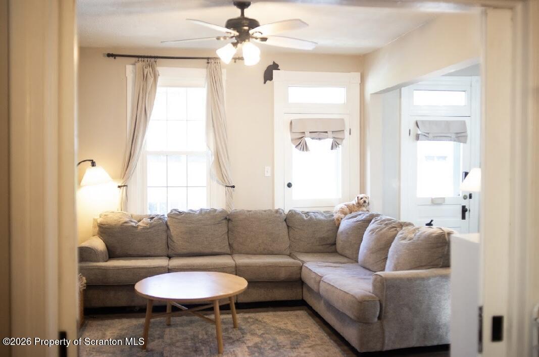 725 Main Street Delta, PA 17314 - Photo 4 of 30 a living room with furniture and a large window