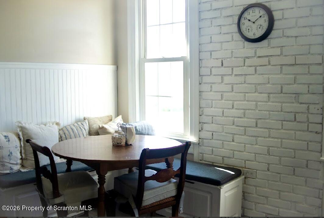 725 Main Street Delta, PA 17314 - Photo 6 of 30 a view of a dining room with furniture and wall clock