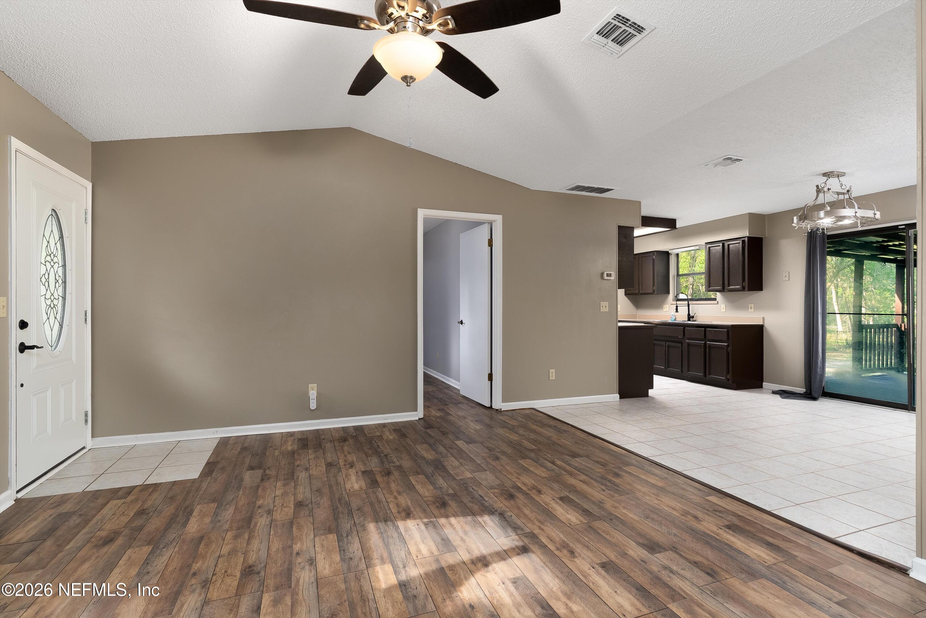 6092 Taylor Road Jacksonville, FL 32234 - Photo 10 of 55 Living Dining into Kitchen area