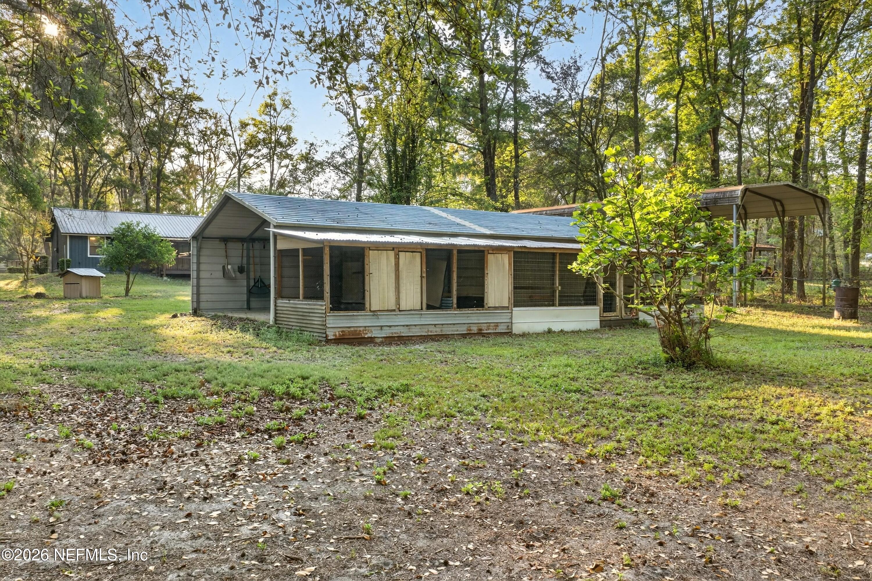 6092 Taylor Road Jacksonville, FL 32234 - Photo 4 of 55 Animal Pen Side of Garage
