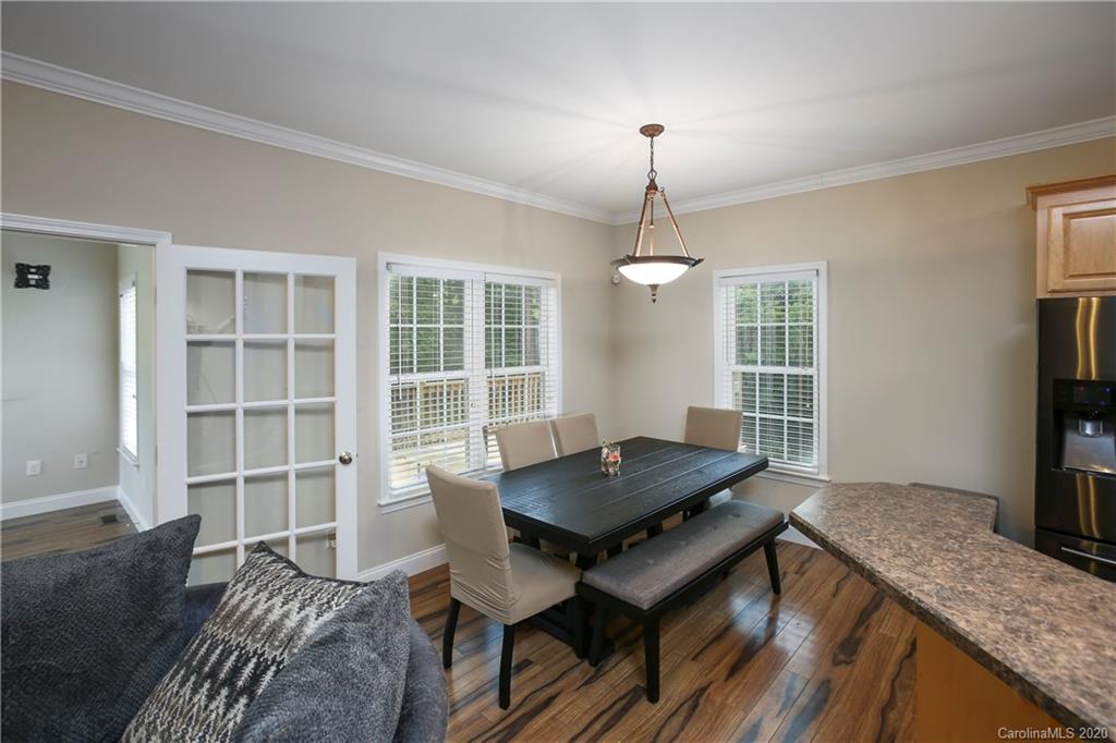 8737 Swift Road Oakboro, NC 28129 - Photo 5 of 19 a view of a livingroom with furniture and window