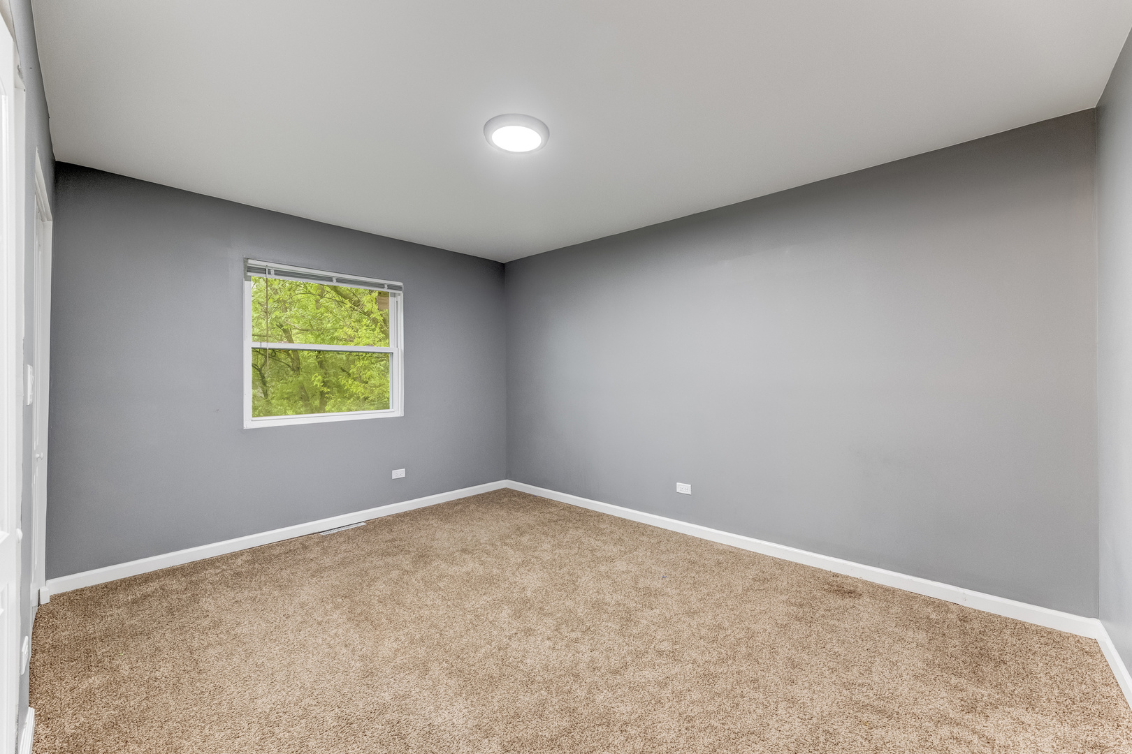 15331 Cherry Lane Markham, IL 60428 - Photo 15 of 23 a view of an empty room with a window