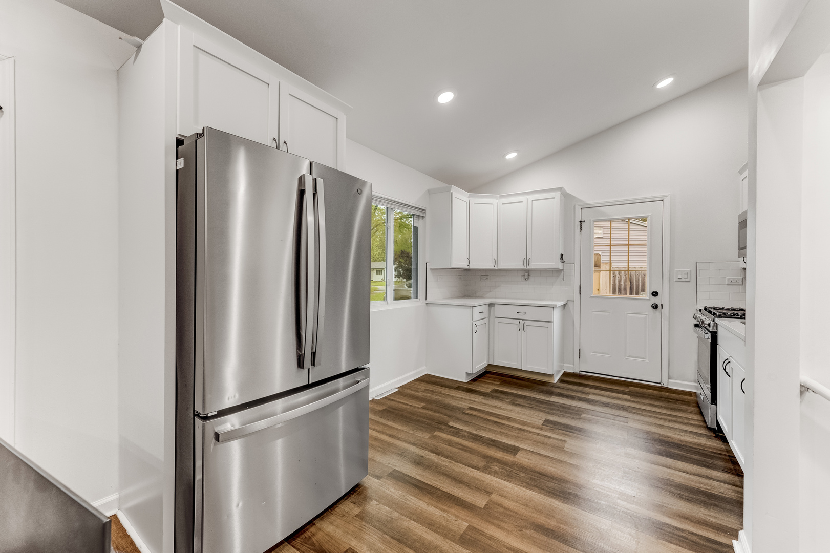 15331 Cherry Lane Markham, IL 60428 - Photo 8 of 23 a kitchen with stainless steel appliances refrigerator and microwave