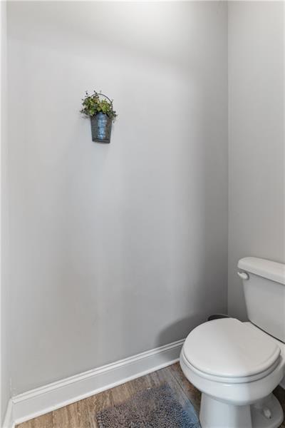 141 Fieldbrook Crossing Canton, GA 30115 - Photo 30 of 45 a white toilet sitting next to a shower