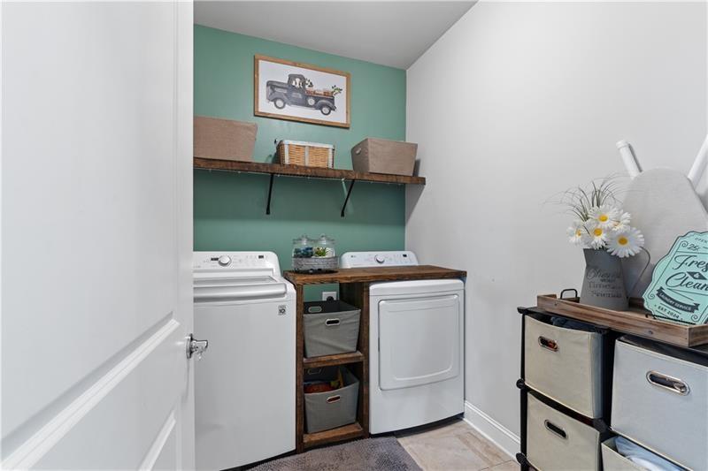 141 Fieldbrook Crossing Canton, GA 30115 - Photo 31 of 45 a utility room with dryer and washer