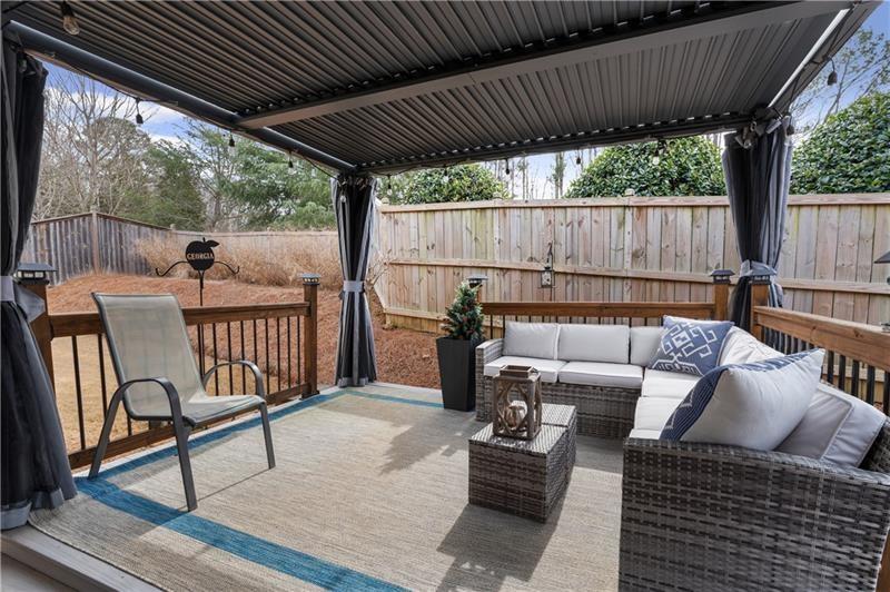 141 Fieldbrook Crossing Canton, GA 30115 - Photo 37 of 45 a view of outdoor sitting area with furniture and wooden deck