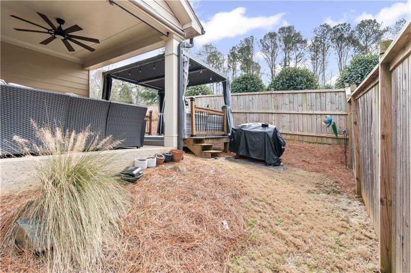 141 Fieldbrook Crossing Canton, GA 30115 - Photo 38 of 45 a backyard of a house with seating space