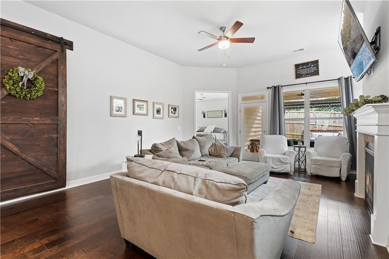 141 Fieldbrook Crossing Canton, GA 30115 - Photo 7 of 45 a living room with furniture and a large window