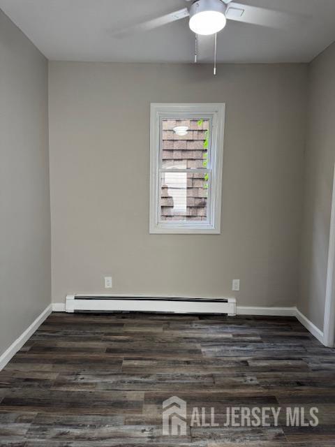 443 Fulton Street, Unit 2 Elizabeth, NJ 07206 - Photo 8 of 9 a view of wooden floor and a chandelier fan in a room