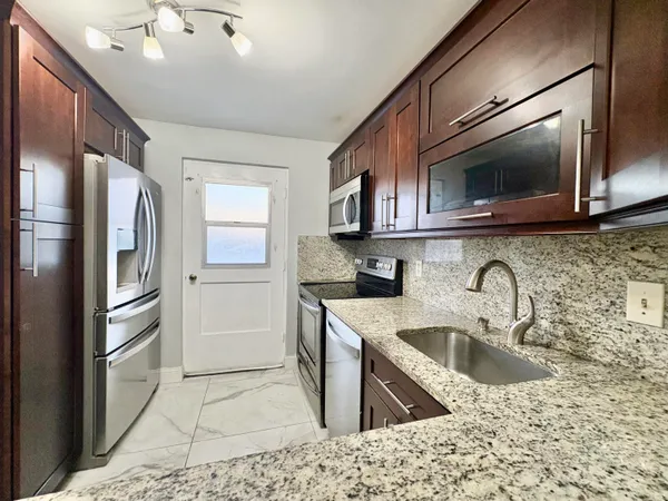 $235,000 | 5700 Northwest 2nd Avenue, Unit 311, Boca Raton, FL 33487