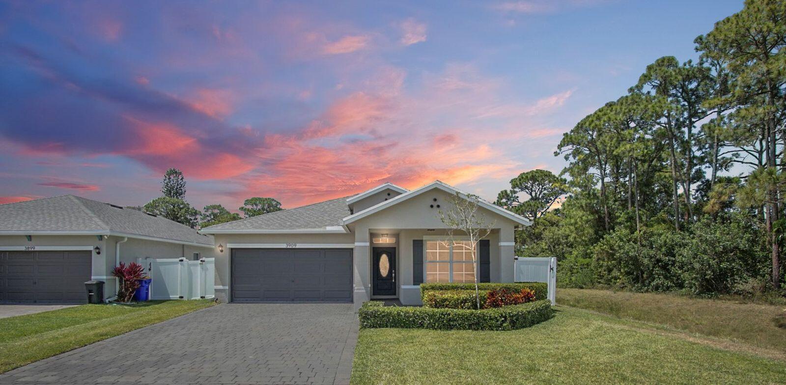 3909 Southeast Lee Street Stuart, FL 34997 - Photo 1 of 19 front twilight