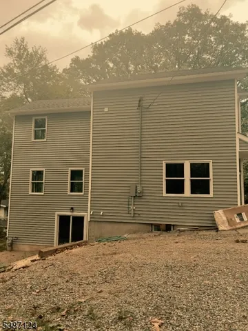 a view of a house with yard