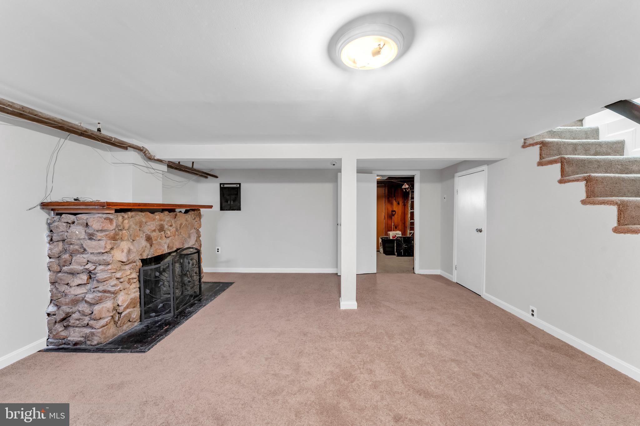 3937 Flowerton Road Baltimore, MD 21229 - Photo 21 of 28 a view of empty room with fireplace
