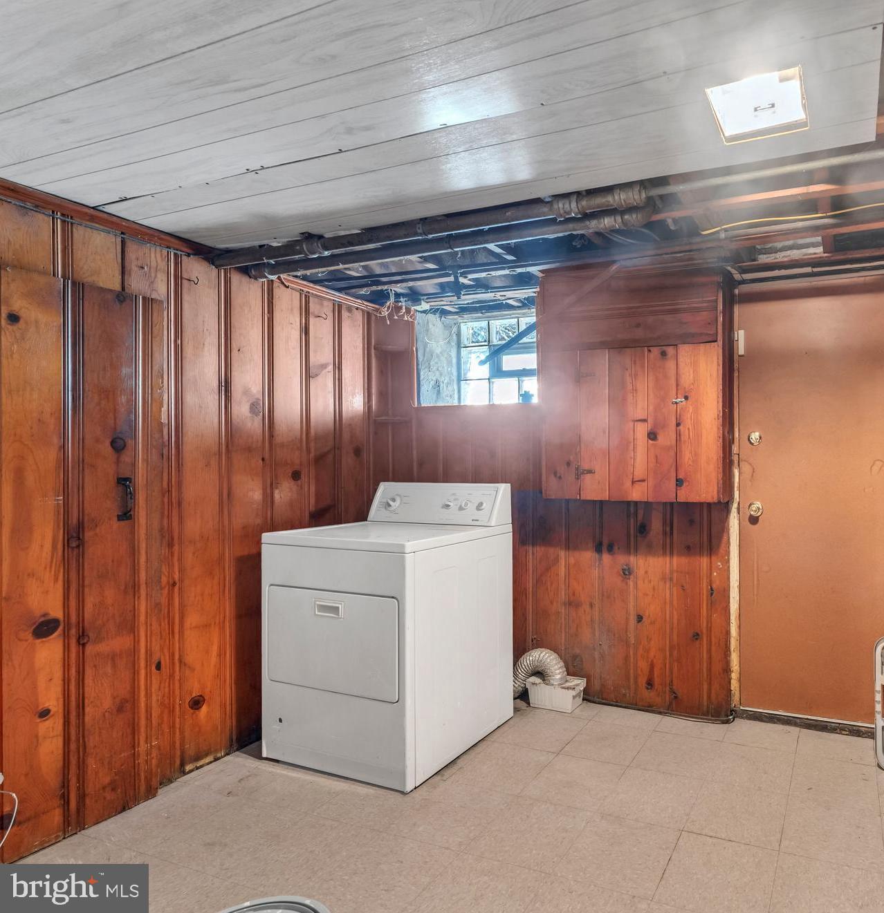 3937 Flowerton Road Baltimore, MD 21229 - Photo 22 of 28 a utility room with dryer and washer