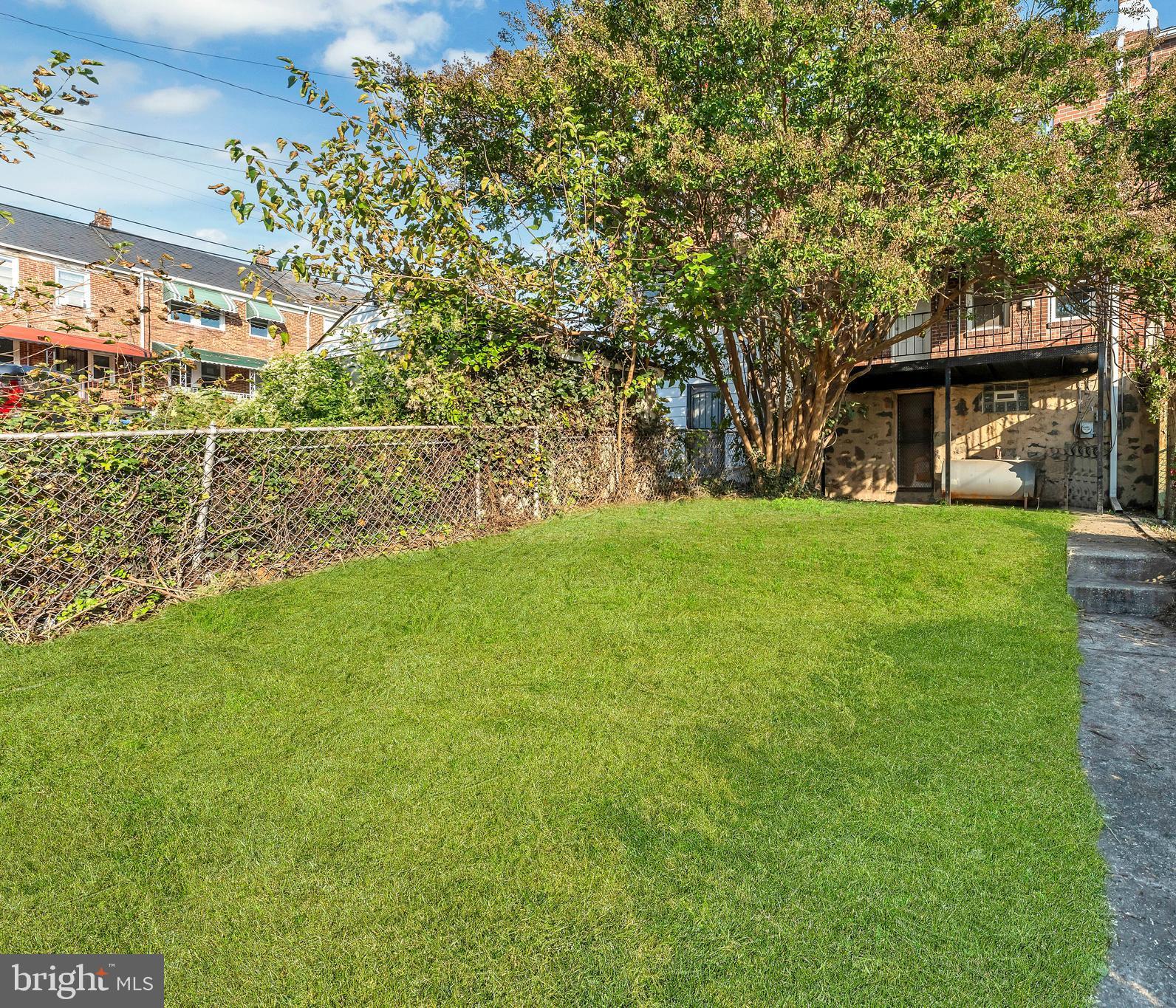 3937 Flowerton Road Baltimore, MD 21229 - Photo 24 of 28 a view of a house with a yard