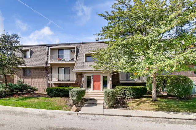208 East Bailey Road, Unit A Naperville, IL 60565 - Photo 1 of 20 front view of house with a yard