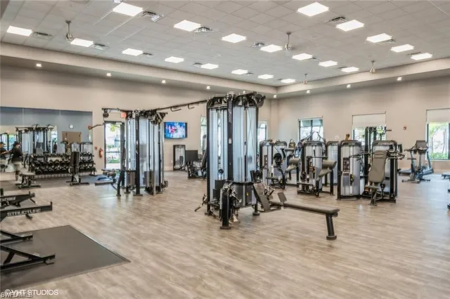 a view of a lake with a table and chairs