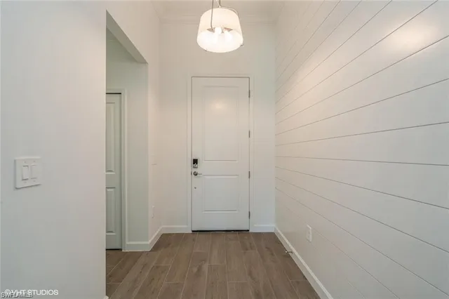 a view of a room that has a window in it