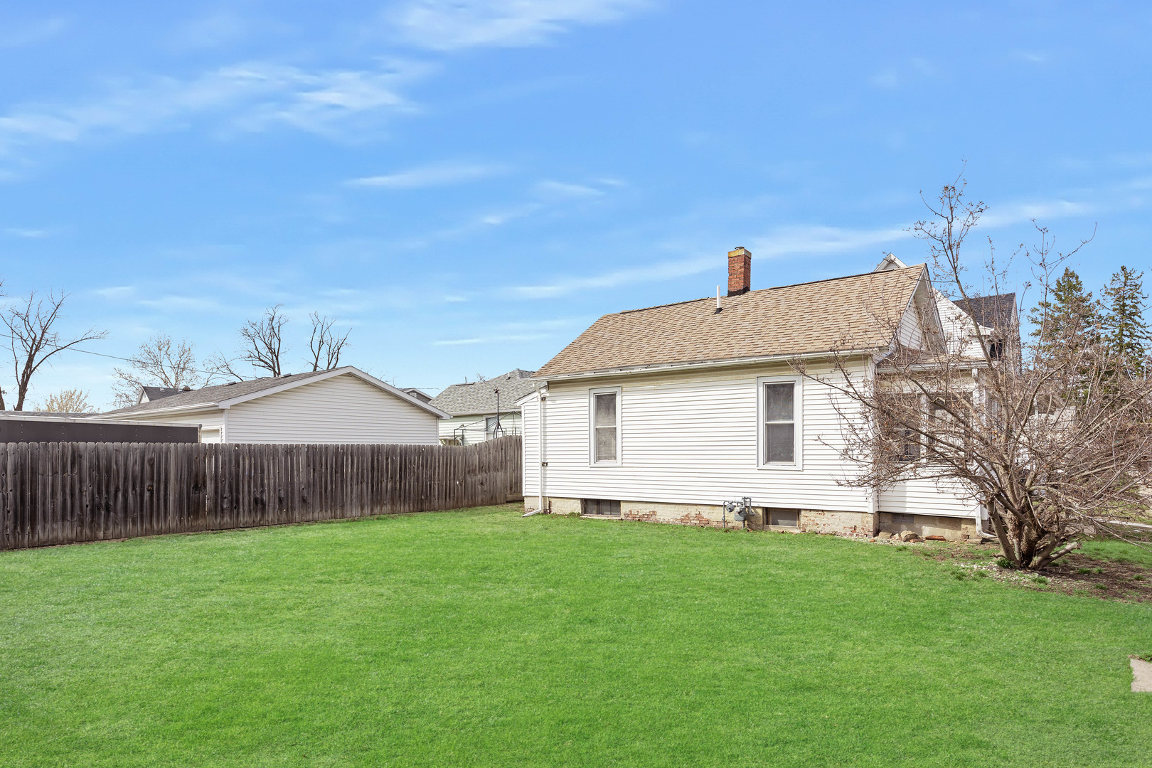 910 North Mason Street Bloomington, IL 61701 - Photo 27 of 29 a view of a house with a yard