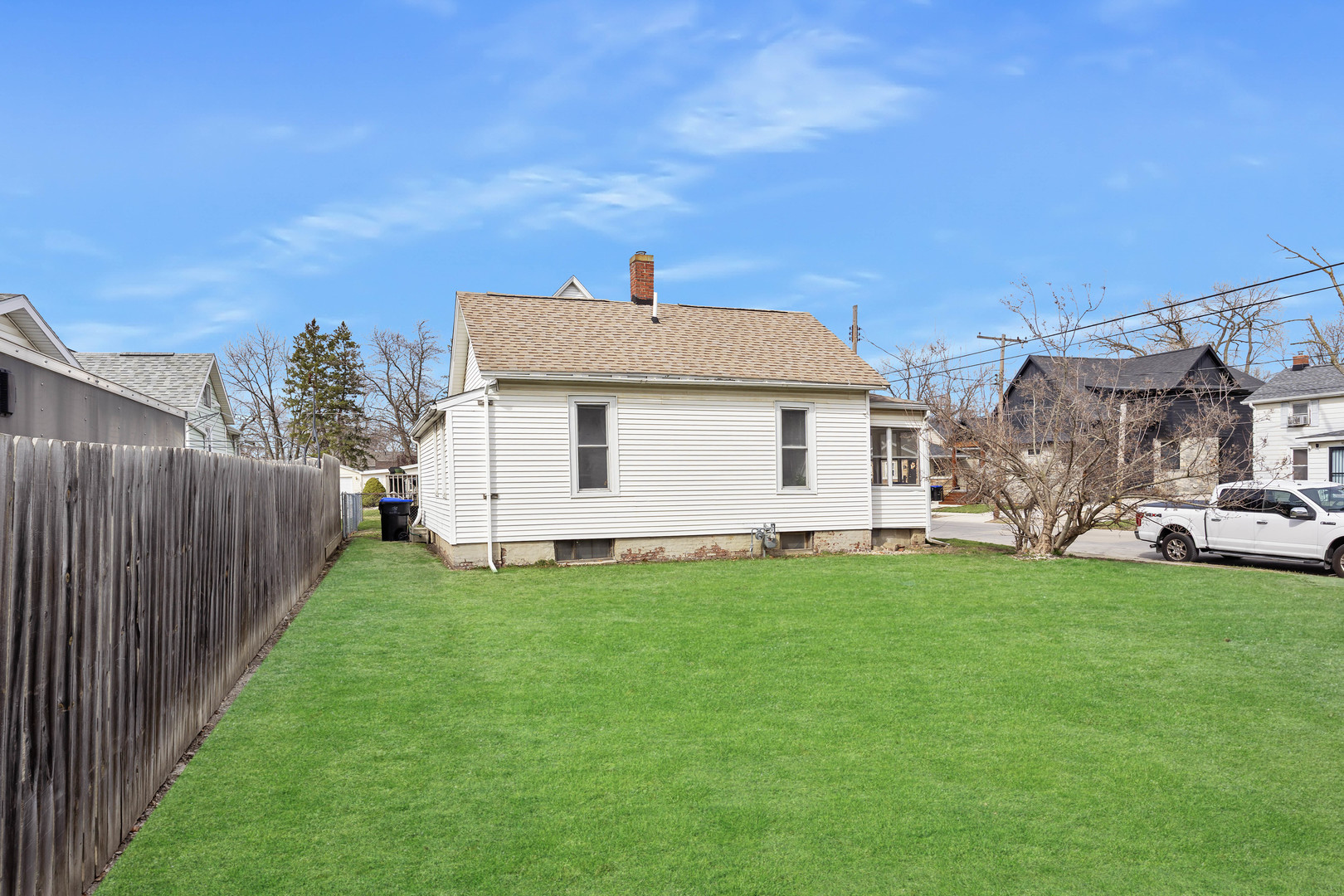 910 North Mason Street Bloomington, IL 61701 - Photo 29 of 29 a aerial view of a house with a yard