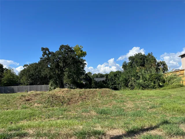 a view of backyard with swimming pool and outdoor space